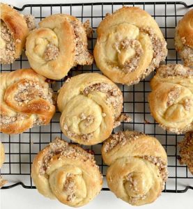 sweet rolls ever with this easy recipe! Soft, orange-zest dough filled with a blend of almonds, cinnamon, and butter, then twisted into spirals and baked to perfection